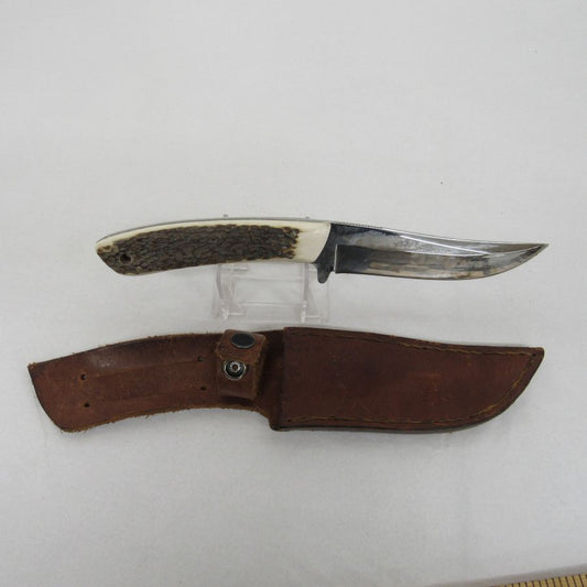Used vintage curved trailing-point fixed-blade skinning knife