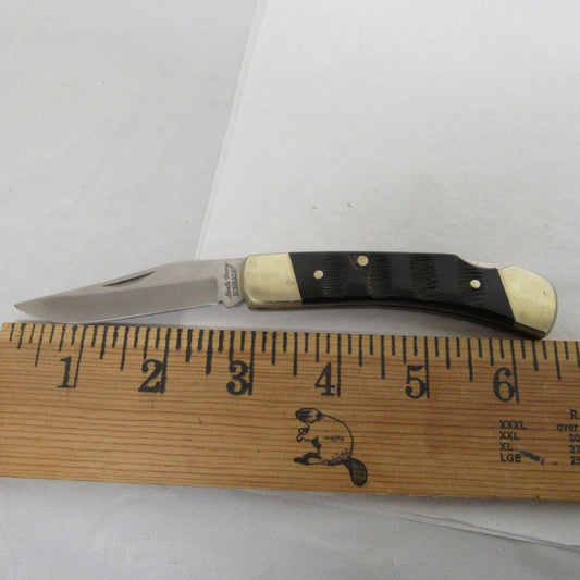 Used Schrade Uncle Henry "Bear Paw" LB7 Lock back folding pocketknife.