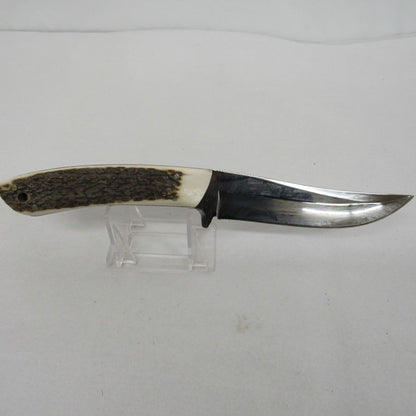 Used vintage curved trailing-point fixed-blade skinning knife