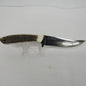 Used vintage curved trailing-point fixed-blade skinning knife