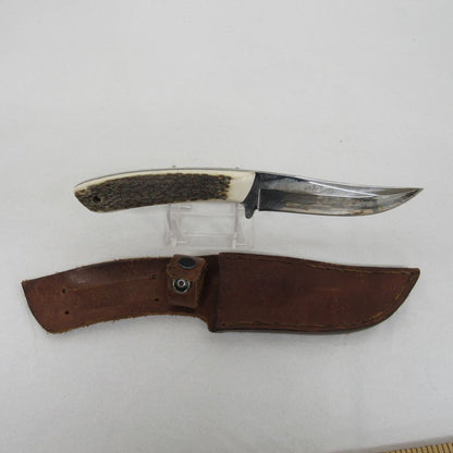 Used vintage curved trailing-point fixed-blade skinning knife