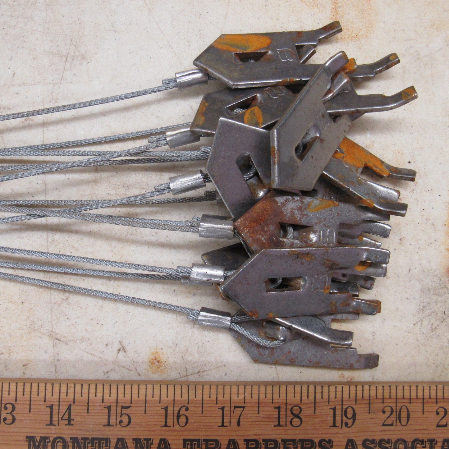 12 New with Surface Rust Wolf Fang 18-inch Cable Stakes